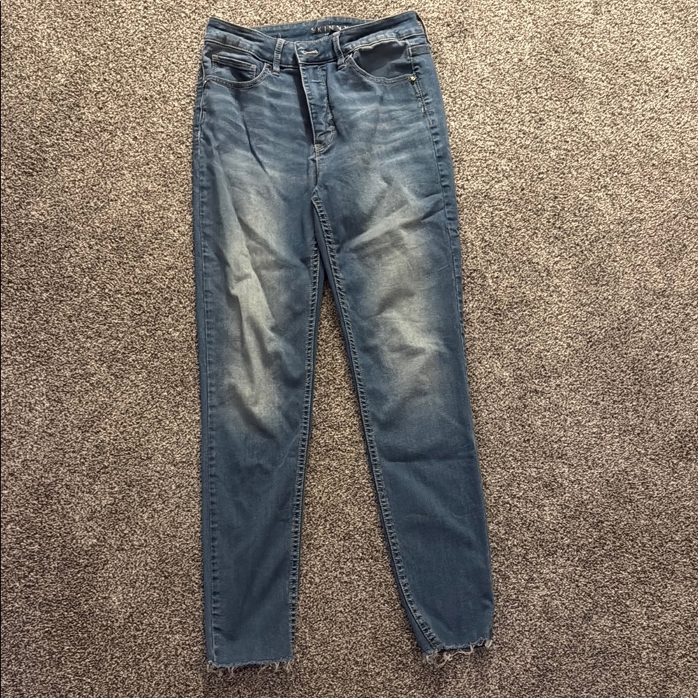 White House Black Market Blue Skinny Jeans with Distressed Finish
